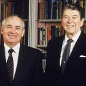 Soviet President Mikhail Gorbachev & American President Ronald Reagan pose together in the White House library, Washington DC, 8 December, 1987. PIC: White House Photos/Getty Images