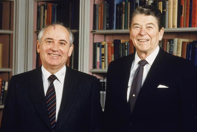 Soviet President Mikhail Gorbachev & American President Ronald Reagan pose together in the White House library, Washington DC, 8 December, 1987. PIC: White House Photos/Getty Images