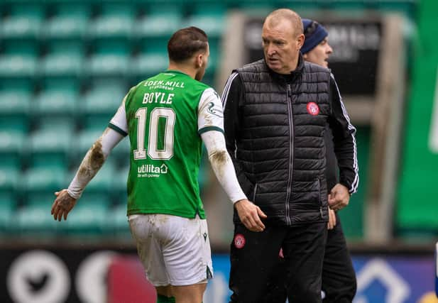 Hamilton manager Brian Rice shares his frustration with Hibs Martin Boyle at half-time after his defender, Jamie Hamilton, had been sent off for a challenge on the Easter Road goalscorer. Photo by Craig Williamson / SNS Group