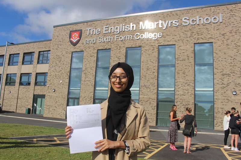Jakiah Khan is all smiles after finding out her A-level results on Tuesday morning.
