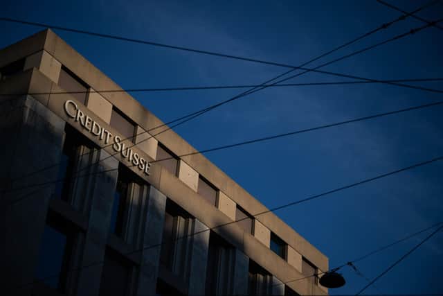 Fears over a banking crisis remained at the fore on Thursday after Credit Suisse said it would borrow up to 50 billion Swiss francs (£45 billion) from Switzerland’s central bank to bolster its finances, sparking hefty falls in Asian trading.(Photo by FABRICE COFFRINI/AFP via Getty Images)