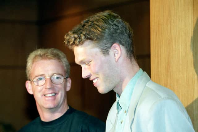 Morten Wieghorst smiles after signing for Celtic from Dundee in December 1995. Manager Tommy Burns looks on.