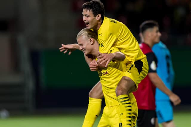 Borussia Dortmund midfielder Giovanni Reyna (right), pictured celebrating a goal with Erling Haaland earlier this season, is a close family friend of Rangers manager Giovanni van Bronckhorst. (Photo by Alexander Scheuber/Getty Images)