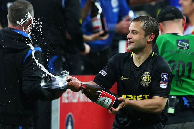 Shaun Maloney celebrates Wigan's victory over Manchester City in the FA Cup.  (Photo by Alex Livesey/Getty Images)