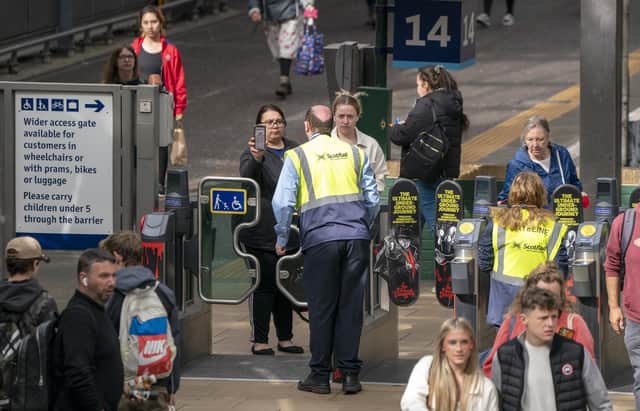 Passengers at Edinburgh's Waverley Station, as train services continue to be disrupted following the nationwide strike by members of the Rail, Maritime and Transport union. Picture: Press Association