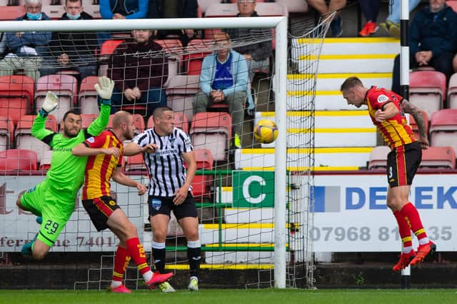 Kevin Holt nods home Partick's second goal in the 3-0 victory over Dunfermline at East End Park (Photo by Sammy Turner / SNS Group)