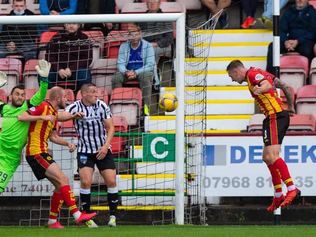 Kevin Holt nods home Partick's second goal in the 3-0 victory over Dunfermline at East End Park (Photo by Sammy Turner / SNS Group)