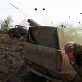 Ukrainian artillery fire towards Russian positions on the front line near Bakhmut in Donetsk (Picture: Anatolii Stepanov/AFP via Getty Images)