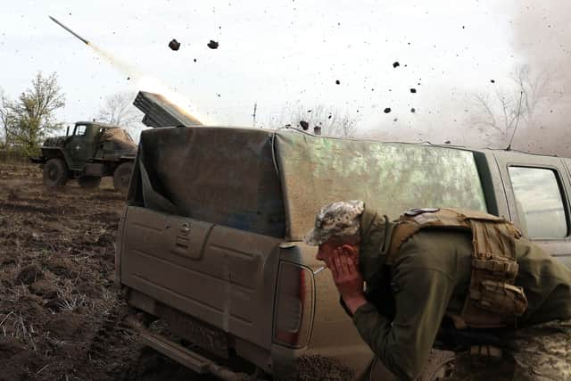 Ukrainian artillery fire towards Russian positions on the front line near Bakhmut in Donetsk (Picture: Anatolii Stepanov/AFP via Getty Images)