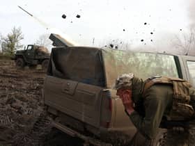 Ukrainian artillery fire towards Russian positions on the front line near Bakhmut in Donetsk (Picture: Anatolii Stepanov/AFP via Getty Images)
