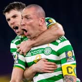 Ryan Christie celebrates with Celtic captain Scott Brown after winning the 2020 Scottish Cup.