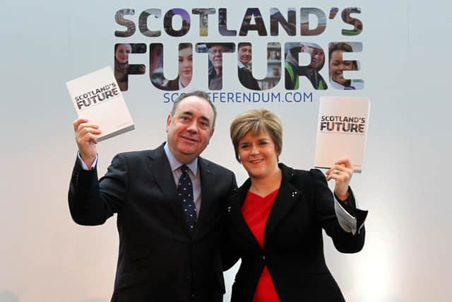 Alex Salmond and Nicola Sturgeon hold copies of the White Paper on independence in 2013