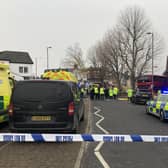 Emergency services at the scene on The Broadway in Highams Park, east London, where a number of people are being treated by paramedics from the London Ambulance Service after a bus collided with a building. Picture date: Tuesday January 25, 2022.