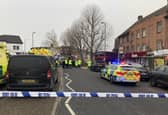 Emergency services at the scene on The Broadway in Highams Park, east London, where a number of people are being treated by paramedics from the London Ambulance Service after a bus collided with a building. Picture date: Tuesday January 25, 2022.