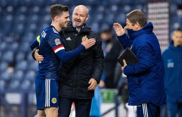 GLASGOW, SCOTLAND - OCTOBER 11: Scotland manager Steve Clarke at full time with Andy Robertson (left) during a Nations League match between Scotland and Slovakia at Hampden Park, on October 11 2020, in Glasgow, Scotland (Photo by Craig Williamson / SNS Group)