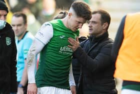 Kevin Nisbet gets a pat from Hibs manager Shaun Maloney after going off injured against Celtic. (Photo by Ross Parker / SNS Group)