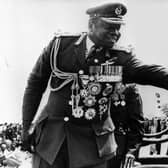 Like Gaddafi, Idi Amin, the former president of Uganda, was fond of displaying his many medals (Picture: Keystone/Getty Images)