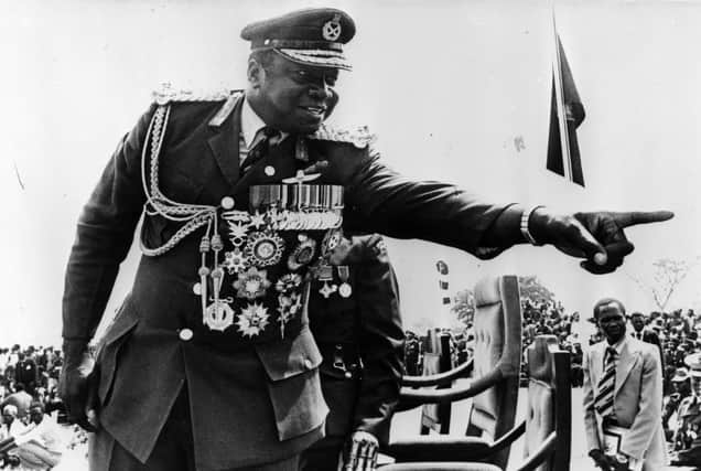Like Gaddafi, Idi Amin, the former president of Uganda, was fond of displaying his many medals (Picture: Keystone/Getty Images)