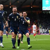 Callum McGregor celebrates with teammates Lyndon Dykes and Andrew Robertson after scoring Scotland's first goal during the Euro 2020 Championship Group D match between Croatia and Scotland (Getty Images)