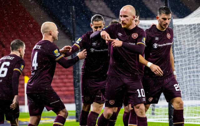 Steven Naismith, far left, celebrates with his team-mates after Liam Boyce's winner.