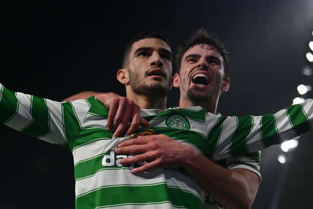 Matt O'Riley celebrates after with goalscorer Liel Abada who makes it 3-0 Celtic. (Picture: John Devlin)