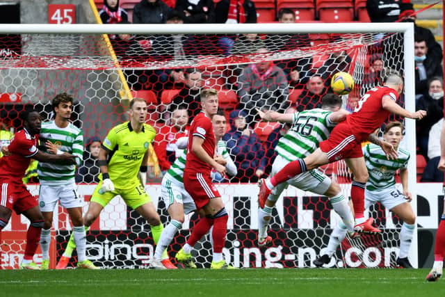 Aberdeen's Scott Brown is denied by Joe Hart in the midfielder's first meeting with his old club in the very fashion he netted at Ibrox last month. Now Ross McCrorie believes Brown is capable of a Glasgow scoring double when on Sunday he makes his first appearance at Celtic Park since ending a 13-year career with the club in the summer. (Photo by Ross MacDonald / SNS Group)