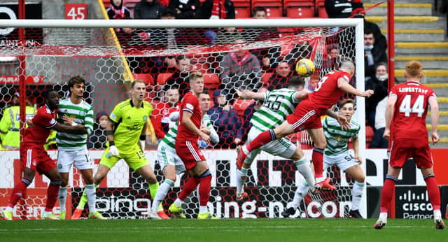 Aberdeen's Scott Brown is denied by Joe Hart in the midfielder's first meeting with his old club in the very fashion he netted at Ibrox last month. Now Ross McCrorie believes Brown is capable of a Glasgow scoring double when on Sunday he makes his first appearance at Celtic Park since ending a 13-year career with the club in the summer. (Photo by Ross MacDonald / SNS Group)