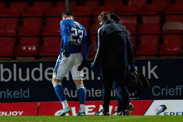 St Johnstone's Nadir Ciftci goes off injured during the 0-0 draw with Dundee at McDiarmid Park. (Photo by Mark Scates / SNS Group)