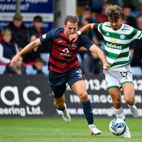 Celtic's Jota (R) and Ross County's Ben Purrington are two of the summer's permanent transfers. (Photo by Rob Casey / SNS Group)