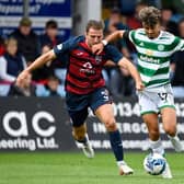 Celtic's Jota (R) and Ross County's Ben Purrington are two of the summer's permanent transfers.  (Photo by Rob Casey / SNS Group)