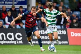 Celtic's Jota (R) and Ross County's Ben Purrington are two of the summer's permanent transfers.  (Photo by Rob Casey / SNS Group)