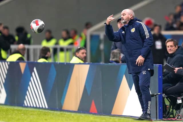 Scotland manager Steven Clarke returns the ball to the field of play during the 4-1 defeat by France.