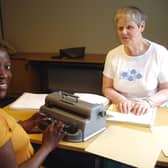 Sue Marshall (right) with one of her students.