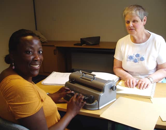 Sue Marshall (right) with one of her students.