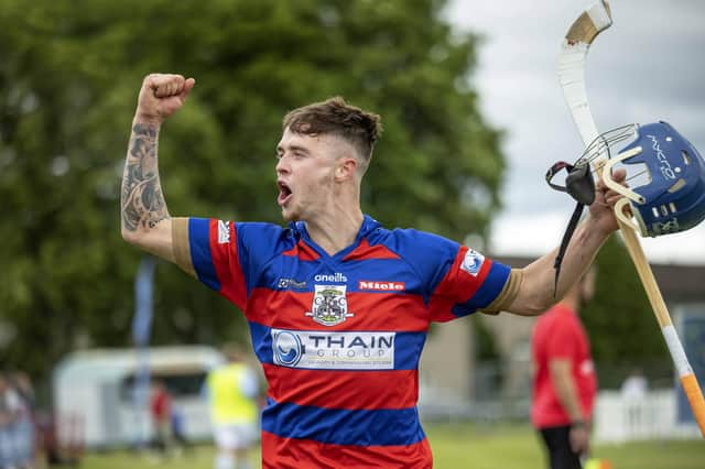 Substituted late in the game, Kingussie's James Falconer responds to the cottages.com MacTavish Cup Final crowd - Caberfeidh v Kingussie, played at The Bught, Inverness.