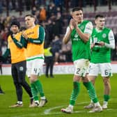 The Hibs player applaud the away fans after the 1-1 draw against Hearts.