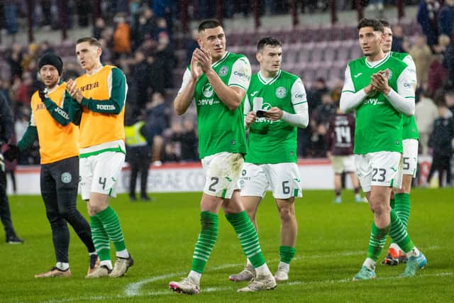 The Hibs player applaud the away fans after the 1-1 draw against Hearts.