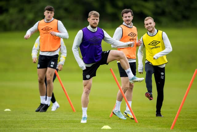 Stephen Kingsley leads Hearts training ahead of Wednesday's trip to Ibrox.