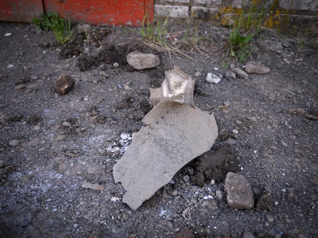 A large piece of missile fragment is seen outside an electricity substation the morning after a rocket strike, on May 04, 2022 in Lviv, Ukraine.  Photo by Leon Neal/Getty Images