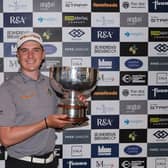 Sam Locke shows off the trophy after winning the Pollok Classic in a three-man play-off. Picture: Tartan Pro Tour.