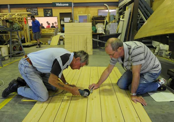 The Men's Shed movement began in Australia, but has since spread to countries around the world, including Scotland (Picture: Torsten Blackwood/AFP via Getty Images)