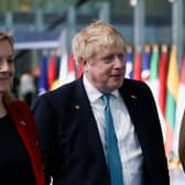 Outgoing Prime Minister Liz Truss, with her predecessor and possible successor Boris Johnson (Picture: Henry Nicholls/pool/Getty Images)