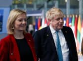 Outgoing Prime Minister Liz Truss, with her predecessor and possible successor Boris Johnson (Picture: Henry Nicholls/pool/Getty Images)