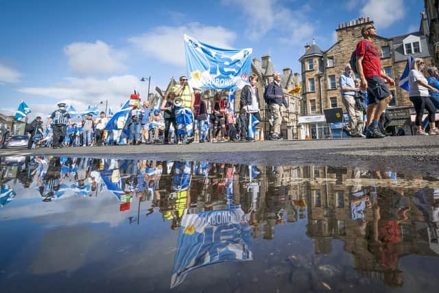 Supporters of Scottish independence march to the site of the Battle of Bannockburn for an 'All Under One Banner' rally in Bannockburn, Stirling. Picture: PA