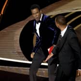 Will Smith slaps Chris Rock onstage during the 94th Annual Academy Awards in Los Angeles.