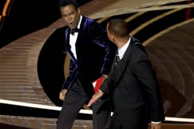 Will Smith slaps Chris Rock onstage during the 94th Annual Academy Awards in Los Angeles.