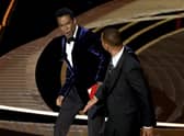 Will Smith slaps Chris Rock onstage during the 94th Annual Academy Awards in Los Angeles.