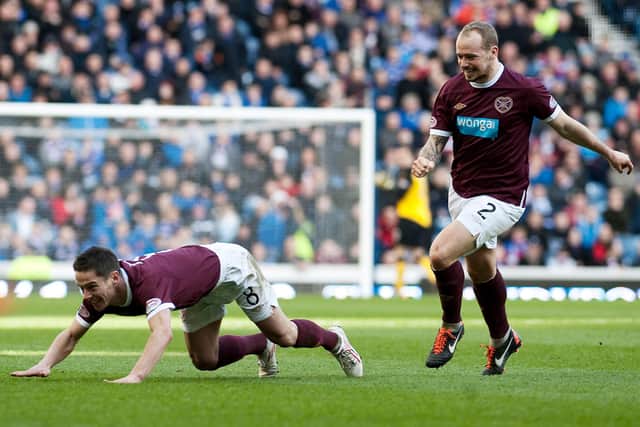 Ian Black celebrates scoring for Hearts against Rangers in 2012. Jamie Hamill, pictured right, also scored that day - the last time Hearts won at Ibrox in the top flight.