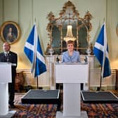 The then First minister Nicola Sturgeon and Scottish Greens co-leaders Patrick Harvie and Lorna Slater announce the Bute House Agreement in 2021, setting up a power-sharing partnership (Picture: Jeff J Mitchell/pool/AFP via Getty Images)