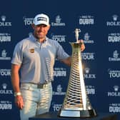 Lee Westwood poses withe Race to Dubai Trophy alongside European Tour chief executive Keith Pelley following the final round of the DP World Tour Championship at Jumeirah Golf Estates in Dubai. Picture: Andrew Redington/Getty Images